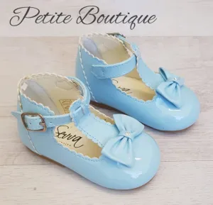 Baby blue patent t-bar bow shoes