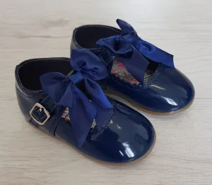 Navy patent bow shoes