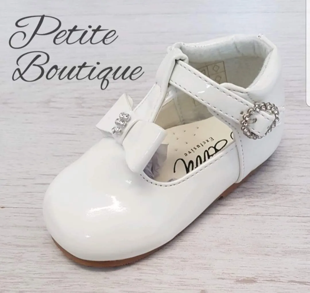 White T-bar shoes